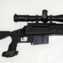 A one-of-a-kind combination: The Savage 110BA DBM Law Enforcement Tactical in 338 LAPUA and top of the line Schmidt & Bender 5-25X56 1/4MOA scope.