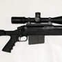 The sleek Armalite 30M in 338 Lapua with matching Velocity 1000 reticle in a Nightforce 5.5-22x56 scope.