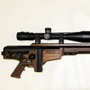 Detail of the Barrett MRAD folding stock and small package. The new brown color was requested by the Armed Forces to work both in jungle and desert.