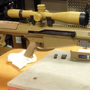 The first Barrett A107 (50 BGM semi-automatic) that we sold in the store.  Paired with Schmidt and Bender top-of-the-line 5-25x56 P4F MRAD Locking in Tan color.