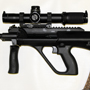 Another Steyr AUG this one with the fantastic Leupold Mark 8 1-8x24 CQBSS scope and a 42 round magazine.