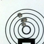Impressive group (0.264 inches - 4 shots at 100 yds.) made with another Remington 308 with a Nightforce 12-42 Benchrest scope. This rifle can be seen in picture number 48 of our Hunting and Target gallery.