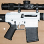"White Hunter": JP Enterpriser LRP-07H in 308 Winchester with U.S. Optics SN3 5-25x58 T-Pal MDMOA 35mm installed with 35mm Badger Ordnance rings.